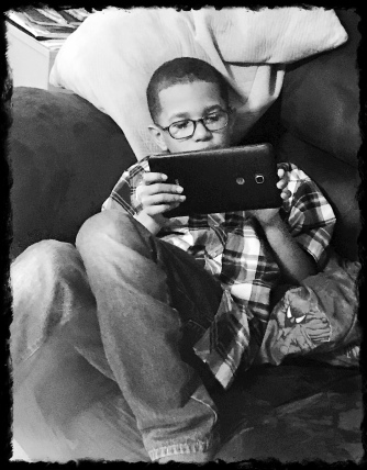Raymond relaxing on the Tablet